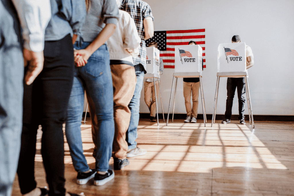 Voters line up at the polls to cast their ballots during a U.S. election. 