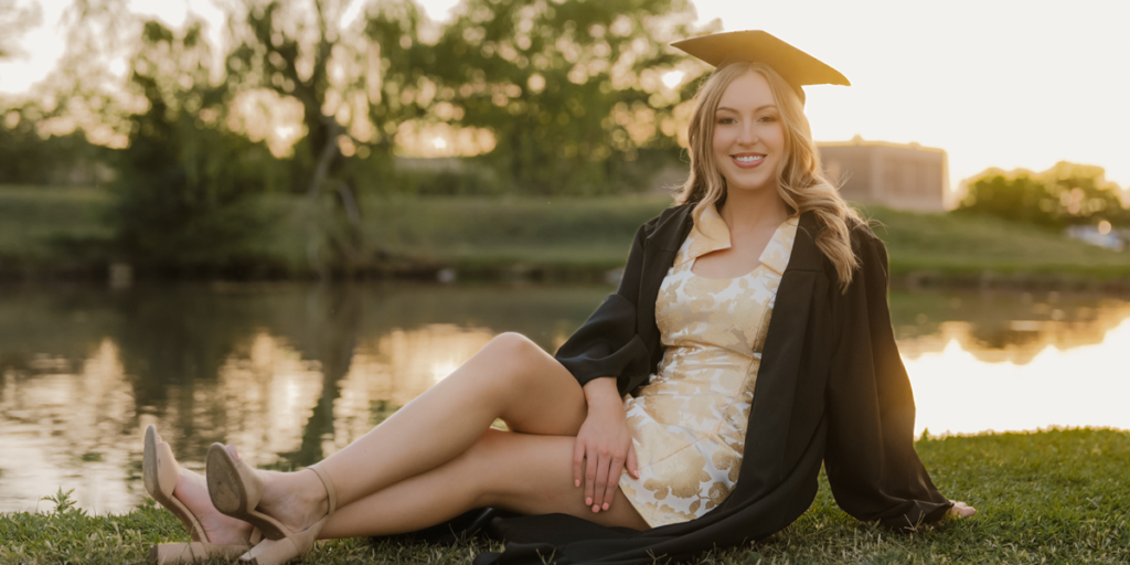 Landscape image of Bailey Sutton in her graduation attire.