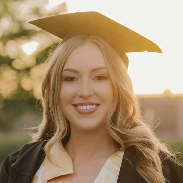 Headshot of Bailey Sutton in her graduation attire.